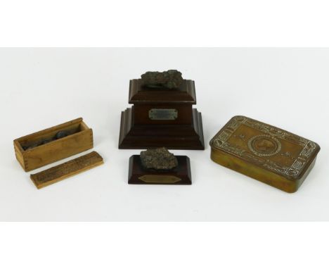A World War One Princess Mary Christmas box, a piece of shrapnel from H M S Barham, Battle of Jutland, June 1st 1916, on a pl