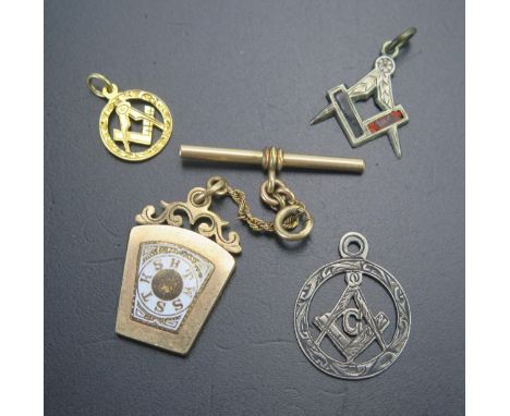 A Masonic Gilt and Enamel Fob, 9ct gold Masonic pendant (.92g), silver Masonic pendant and one other 