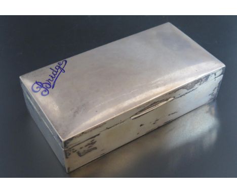 A George V silver playing card box, maker Mappin &amp; Webb, London, 1912, of rectangular outline, the hinged lid enclosing a