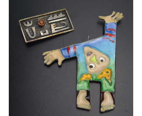 An Ecuador .900 Silver brooch and an enamel brooch 