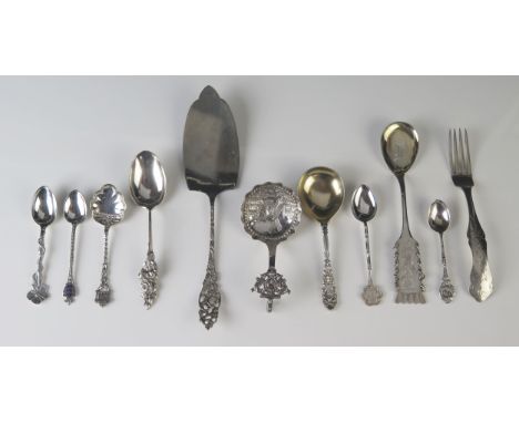 A collection of continental silver serving spoons, fork, caddy spoon etc. total weight of silver 206gms, 6.49ozs 
