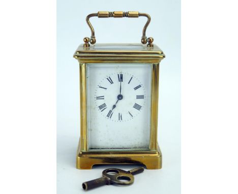 A French brass carriage timepiece (Not running) together with a 1902's mahogany mantel clock. 