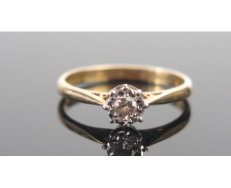 An 18ct Gold and Brilliant Cut Diamond Illusion Set Solitaire Ring, size M.5, hallmarked, 2.38g 