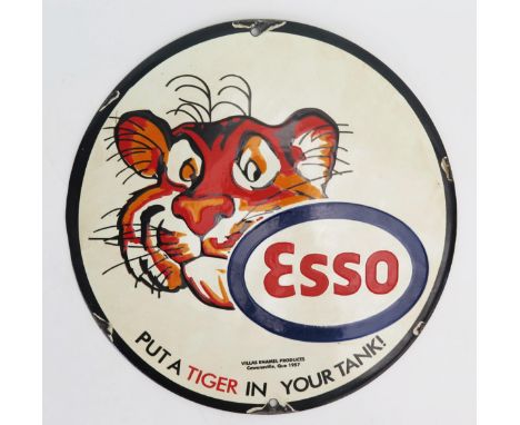 A reproduction enamel circular advertising sign, Esso 'Put A Tiger In Your Tank' 30.5cm diameter. 