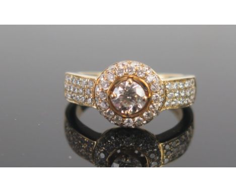 An 18ct Gold and Diamond Ring, 4.84mm principal round cut stone, stamped 750, size M, 6.54g 