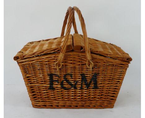 A Fortnum &amp; Mason wicker picnic hamper. 