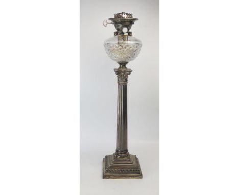 A late Victorian silver oil lamp, &nbsp;maker Hawksworth, Eyre &amp; Co Ltd, Sheffield, 1900, with plated Hink's Duplex paten
