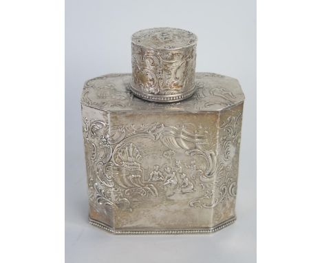 A Dutch silver tea caddy, and cover, stamped marks, with embossed decoration of figures with in flowers and scrolls, 11cm hig