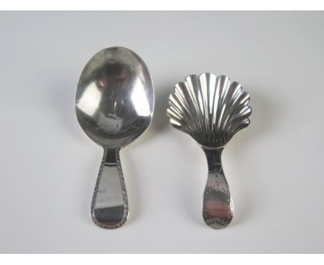 A George IV silver Old English pattern caddy spoon, maker William Chawner II, London, 1822, of plain form, together with anot