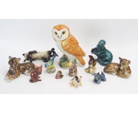 Doulton, Poole Beswick and others, a collection of assorted animal and bird figurines including otter, owl, cat, Koala, wren 