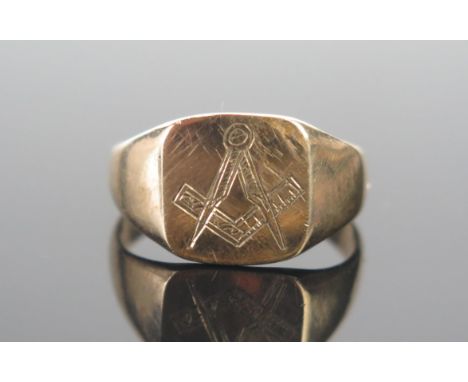 A 9ct Gold Masonic Ring engraved with a square and compass, size M.5, rubbed Chester hallmarks, 3.32g