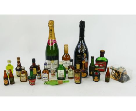 One bottle Henri Cachet Champagne, one bottle German sparkling wine and various assorted miniatures. 