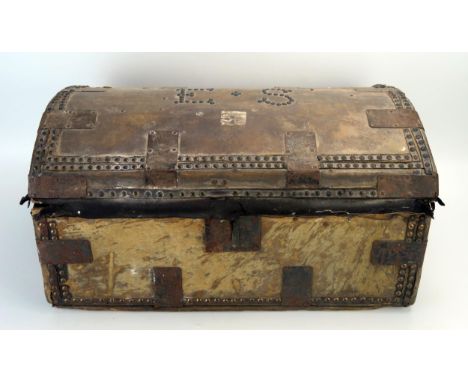 A hide and metal mounted domed travelling trunk, with  initials E S to the hinged lid and  loop carrying handles to the sides
