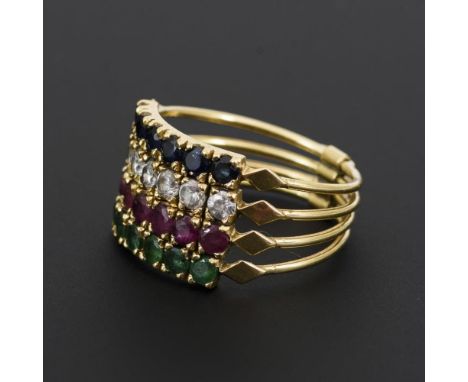 "Harem-Ring" mit verschiedenen Steinen                Gelbgold 14 gestempelt, 585 geprüft.        Ringgröße 61.        5,9 g.