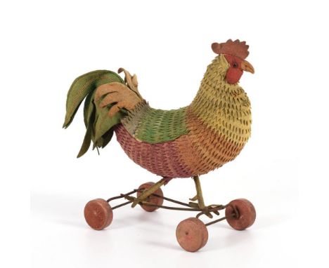 Hahn auf Rädern    Steiff.        Ohne Knopf.        1916-1929.                    Filz, Metall.        H 30 cm.             