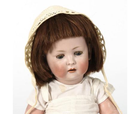 Charakterbaby    König &amp; Wernicke.        Gemarkt "K &amp; W 7".                    Biskuitporzellan, Masse.        L 40 