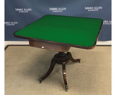 A 19th Century rosewood and brass strung fold-over card table, the top opening to reveal a green baize-lined interior on a tu