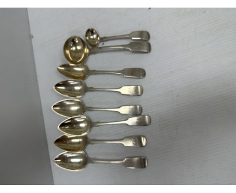 A set of six George III silver "Fiddle" pattern dessert spoons and matching sauce ladle (by William Williams II, London 1793)