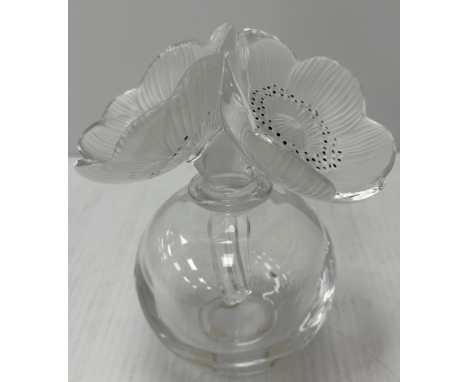 A Lalique "Les Anemones" perfume bottle of globe form, signed "Lalique" to base, 16 cm high, with Lalique cardboard box CONDI