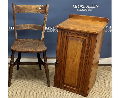 A 19th Century figured mahogany tea table, the rounded rectangular single piece snap top on a baluster turned and ringed pede