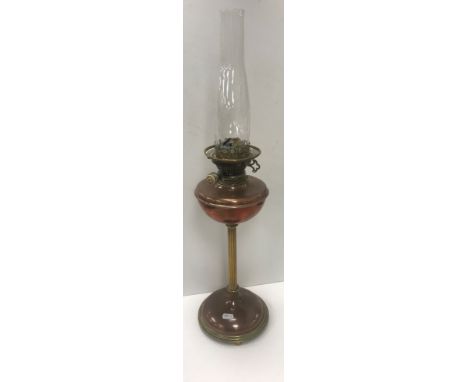 A 19th Century Hinks's No 2 duplex oil lamp with brass column support and circular domed copper base 67cm inc, chimney 
