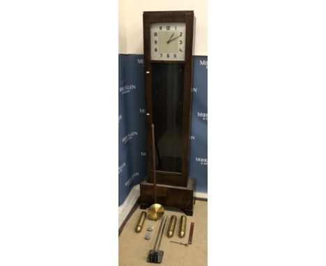 A 1930s oak cased long case clock, the musical movement with square silvered dial and Roman numerals, 56.5 cm wide x 27.5 cm 