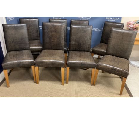 A set of eight modern faux crocodile skin covered high back dining chairs on square tapered light oak supports, 48.5 cm wide 