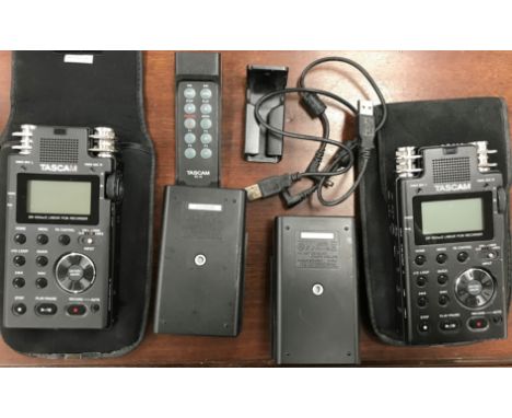 A Tascam DR-100 Mark II Linear PCM recorder with Tascam RC10 remote and battery unit (x 2), together with a box of various ca