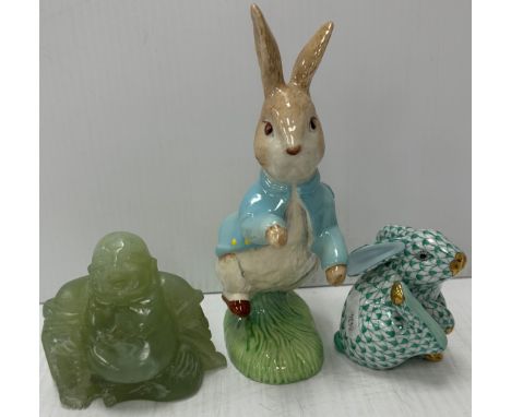 A Herend figure of a hare, 7.5 cm high, a Royal Doulton Beswick Beatrix Potter figure of "Peter Rabbit", dated 1992, 17 cm hi