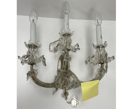 A pair of blown and cut glass three light wall sconces in the Venetian taste with applied flower head decoration 38 cm wide x