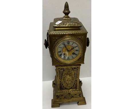 A circa 1900 pierced brass cased long case mantel clock, the eight day movement by S Marti of Paris, with circular dial and s