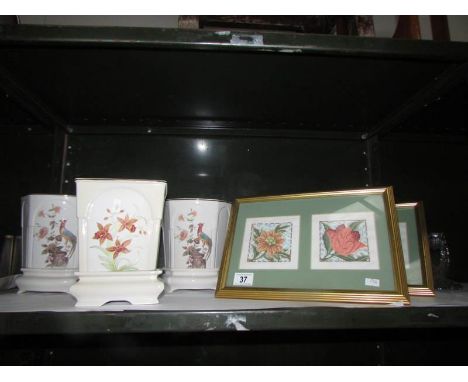 3 ceramic planters on stands and 2 framed and glazed tapestries