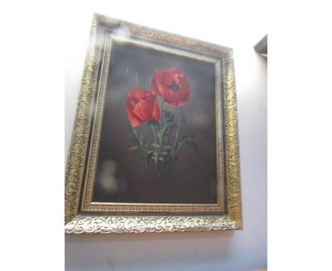 A gilt framed print of poppies
