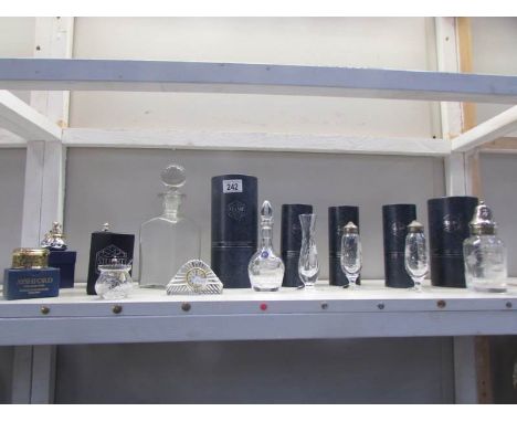 A quantity of Stuart crystal, a decanter and a clock