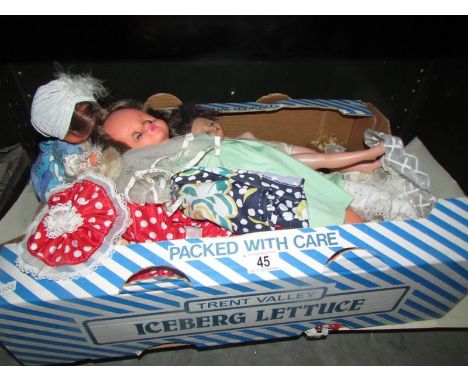A box of vintage dolls