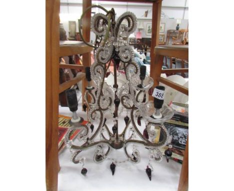 A vintage 4 lamp chandelier