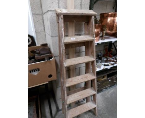 A wooden step ladder
