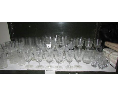 A mixed lot of wine glasses, tumblers etc (one shelf)