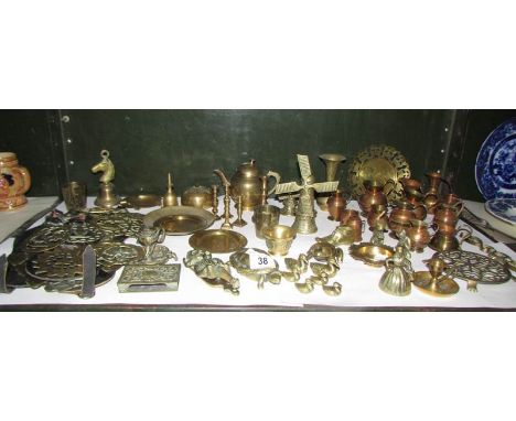 A quantity of brass and copper items including Lincoln Imp door knocker