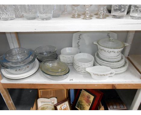 A shelf of assorted pyrex