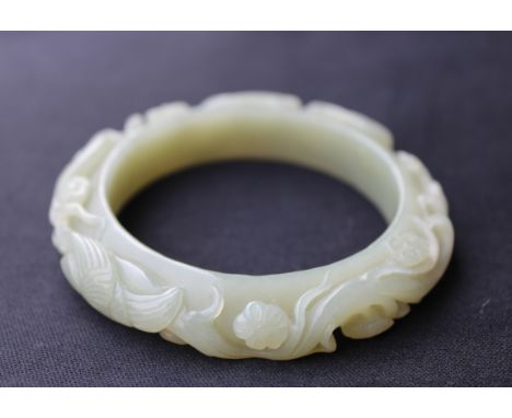 Carved Chinese Jade Bangle. Provenance: Private California collection.