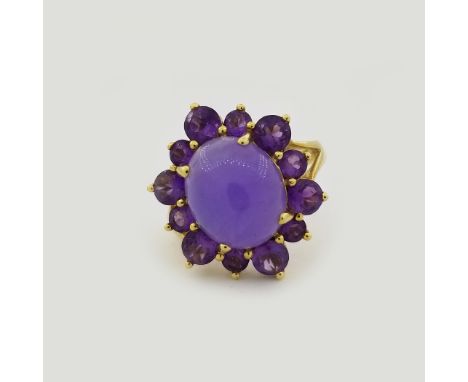 14K Lavender Jade & Amethyst Ring. Cabochon lavender jade center stone surrounded by 12 round-cut amethysts in alternating si