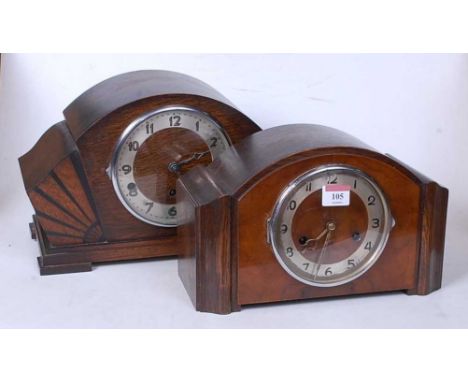 A 1950s oak cased mantel clock having a silvered dial with Arabic numerals and eight day movement, together with one other 19