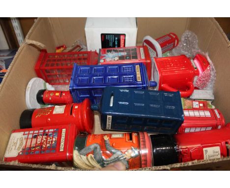 A collection of assorted novelty moneyboxes to include Police public call phone boxes, pillar boxes, etc