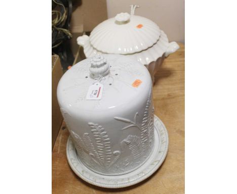 A white glazed ceramic floral decorated circular cheese dish and cover, height 30cm, together with a twin handled glazed cera