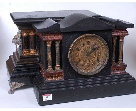 A Victorian faux slate cased mantel clock, of architectural form, having a painted dial flanked by lion ring mask handles, ra