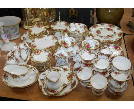 An extensive Royal Albert 12 place setting tea and dinner service in the Old Country Roses  pattern to include dinner plates,