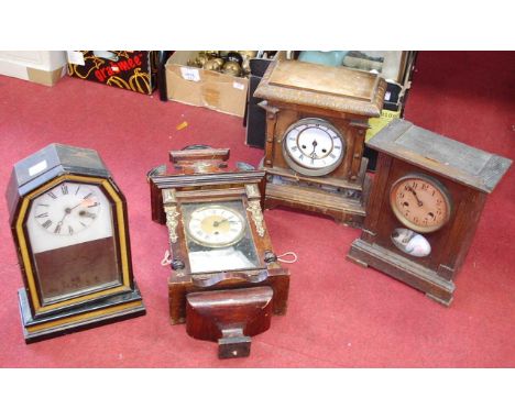 A late 19th century ebonised and parcel gilt mantel clock, having a white painted dial with Roman numerals, enclosed by a gla