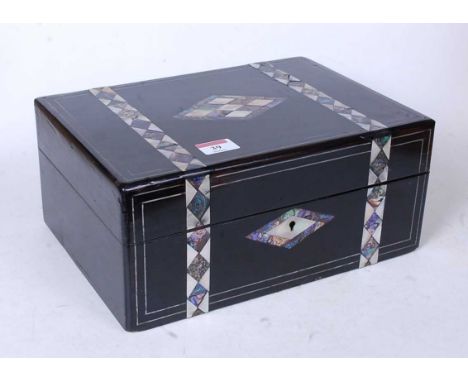 A Victorian ebonised mother of pearl and paua shell inlaid lady's work box, the hinged lid opening to reveal fitted interior 