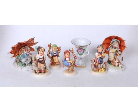 A collection of four Hummel figures, to include Appletree Boy, Feeding Time, Appletree Girl, and Little Goat-herder; together